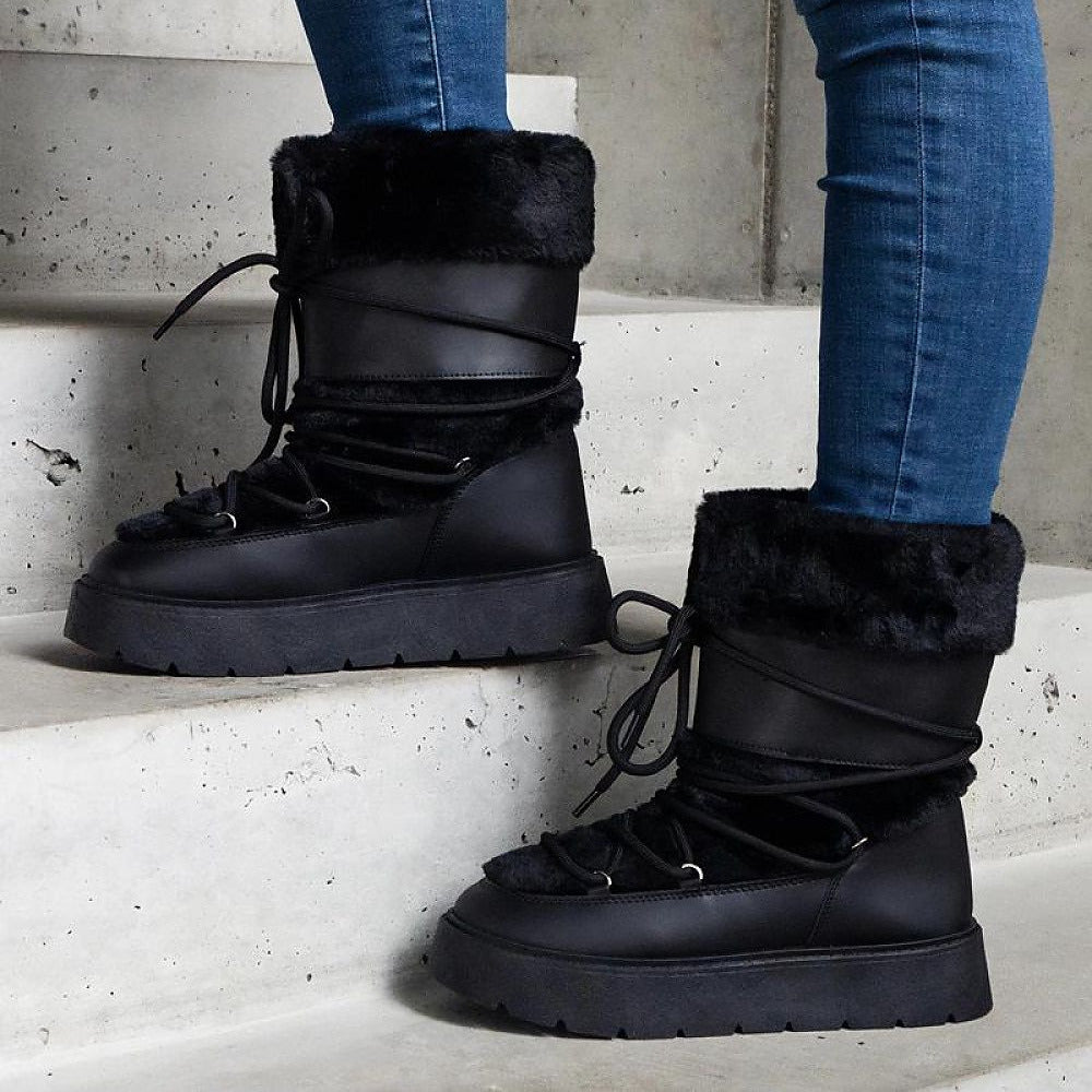 Schneeschuhe mit Pelzverzierung